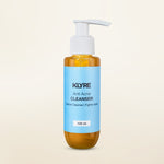 KLYRE anti-acne cleanser bottle on a beige background