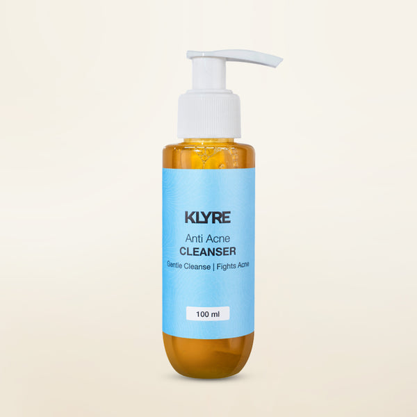 KLYRE anti-acne cleanser bottle on a beige background