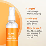 KLYRE sunscreen spray bottle with product details on an orange and beige background